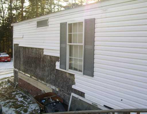 21 White Road Bowdoinham, ME 04008 - Photo 5 of 16 Other. Exterior back - missing siding
