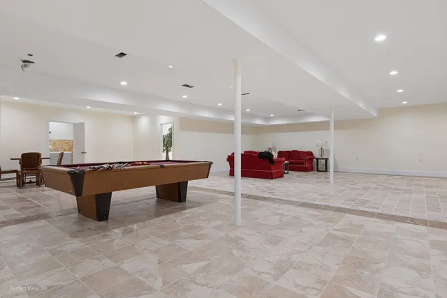 a utility room with sink dryer and washer