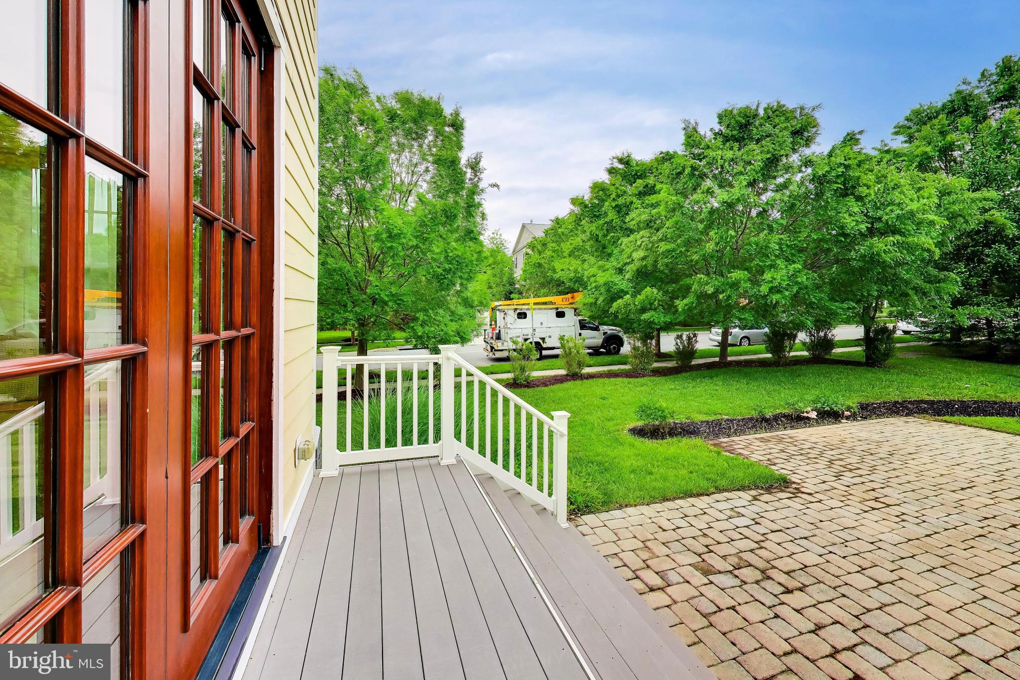 13513 Moonlight Trail Drive Silver Spring, MD 20906 - Photo 55 of 78 a view of a porch with a yard