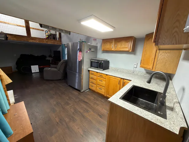 a view of a balcony with wooden floor