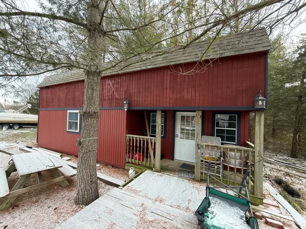 a view of house with a patio