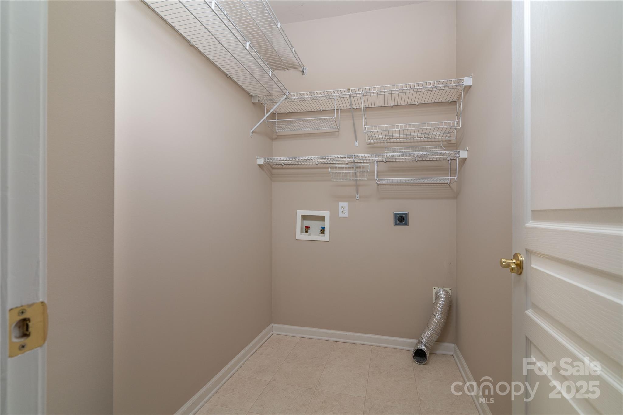 9514 Kestral Ridge Drive Charlotte, NC 28269 - Photo 11 of 32 a view of utility room