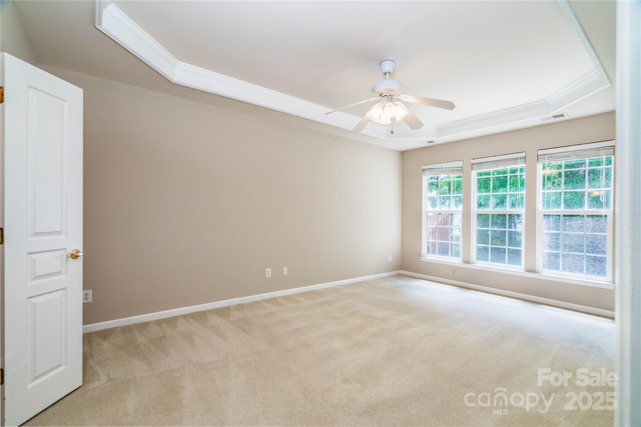 9514 Kestral Ridge Drive Charlotte, NC 28269 - Photo 20 of 32 a view of an empty room with a window