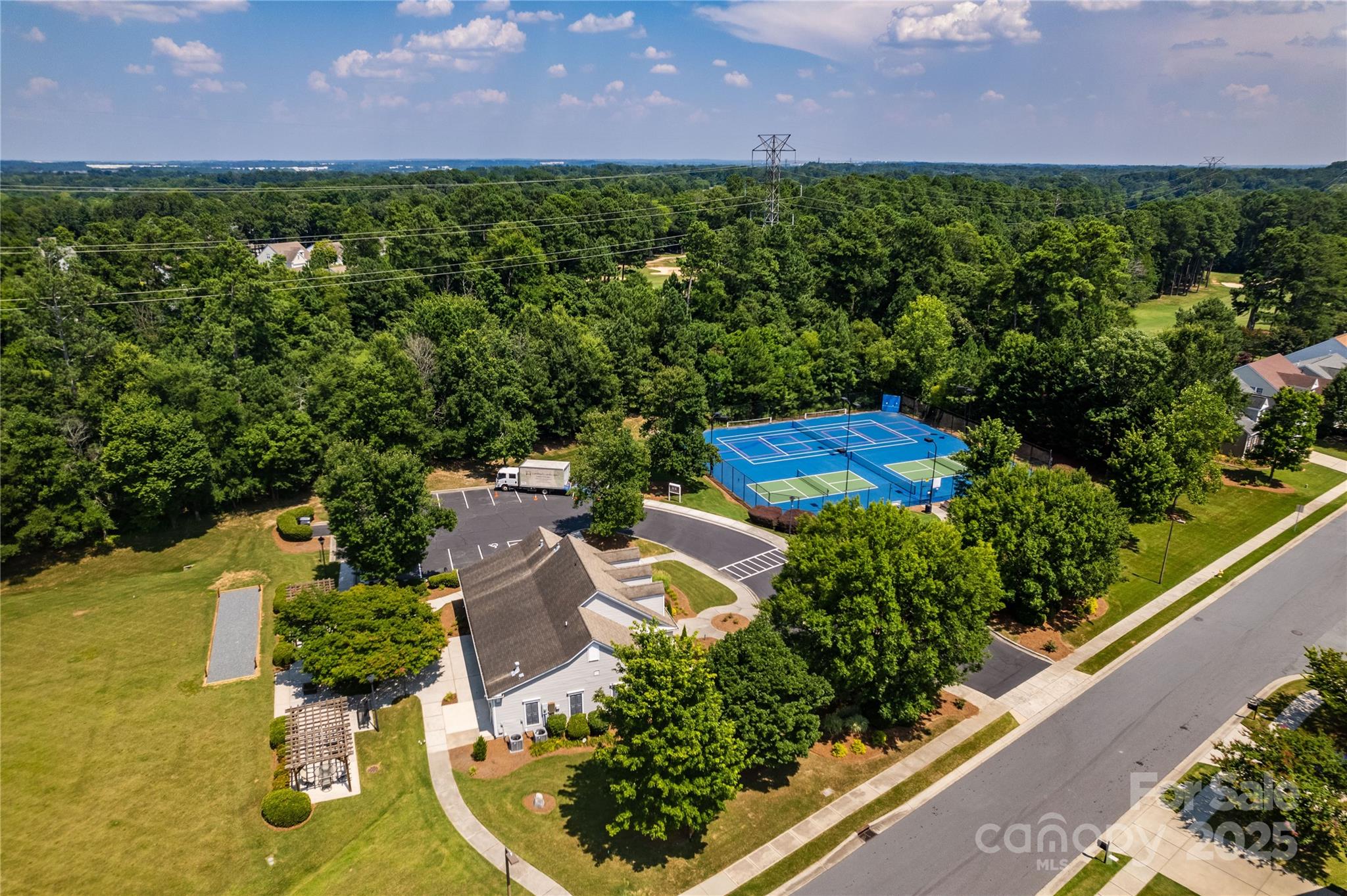 9514 Kestral Ridge Drive Charlotte, NC 28269 - Photo 29 of 32 an aerial view of a house with a yard and lake view
