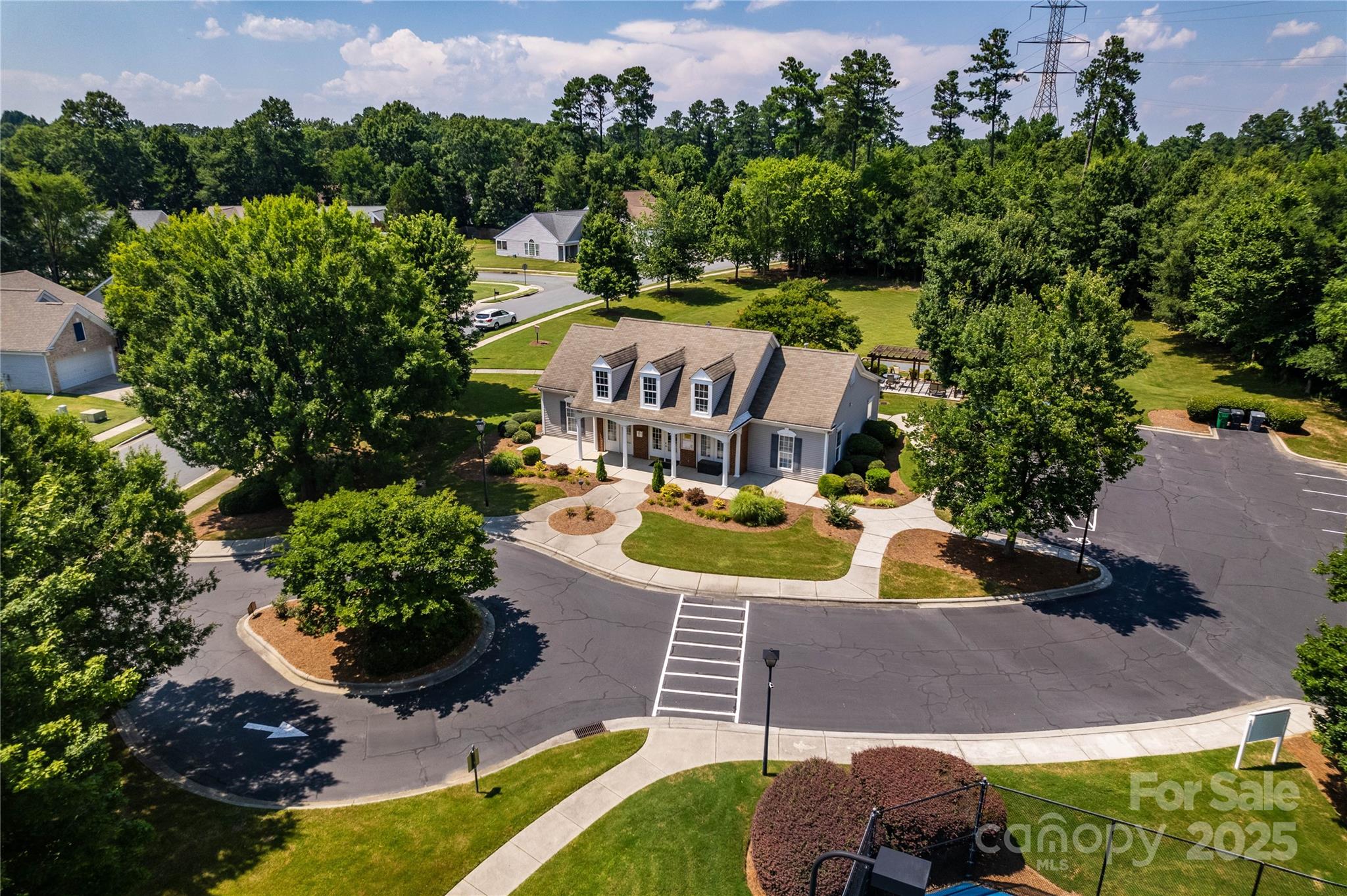 9514 Kestral Ridge Drive Charlotte, NC 28269 - Photo 31 of 32 an aerial view of a house with a garden