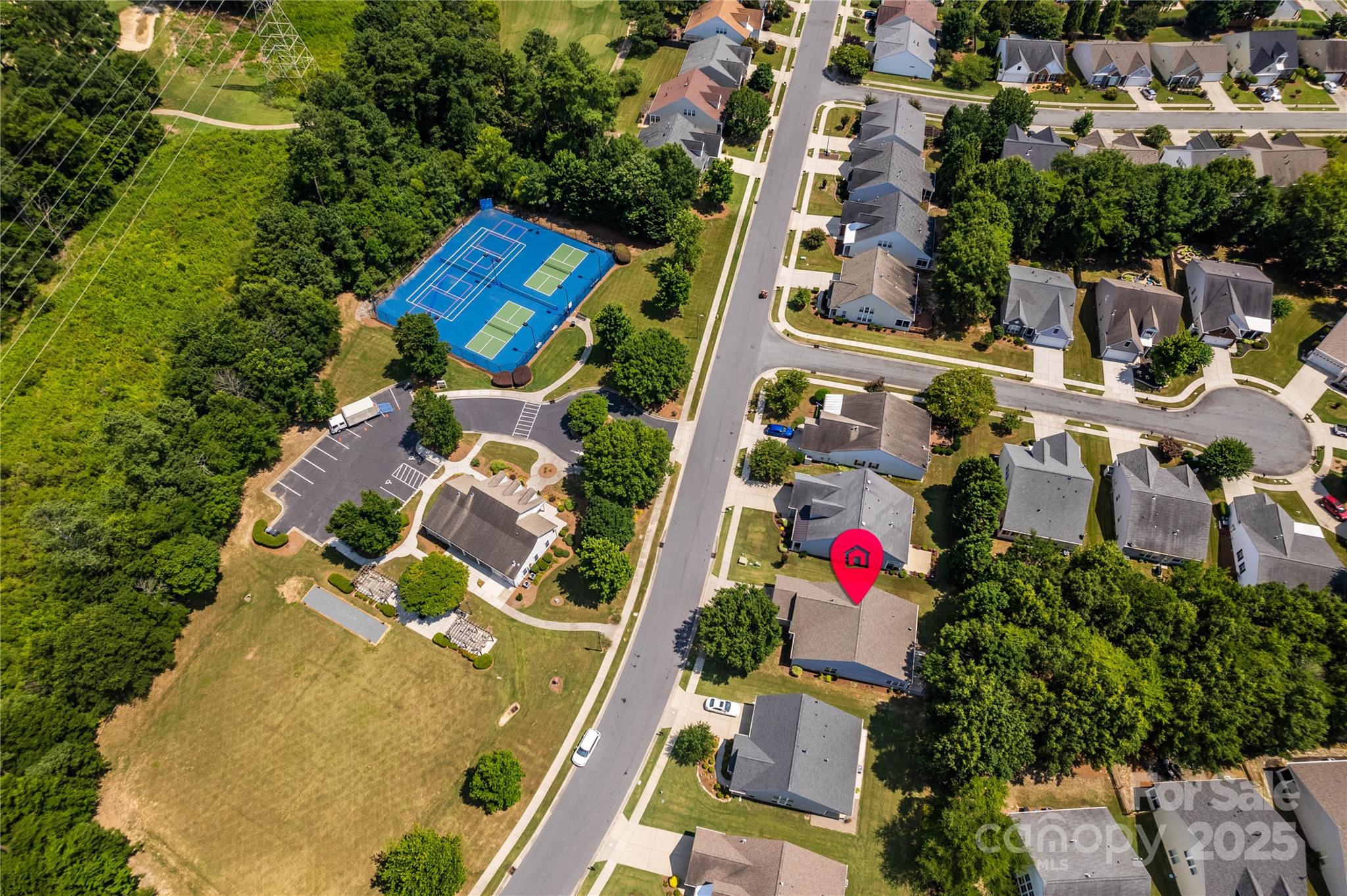 9514 Kestral Ridge Drive Charlotte, NC 28269 - Photo 32 of 32 an aerial view of residential house with outdoor space and swimming pool