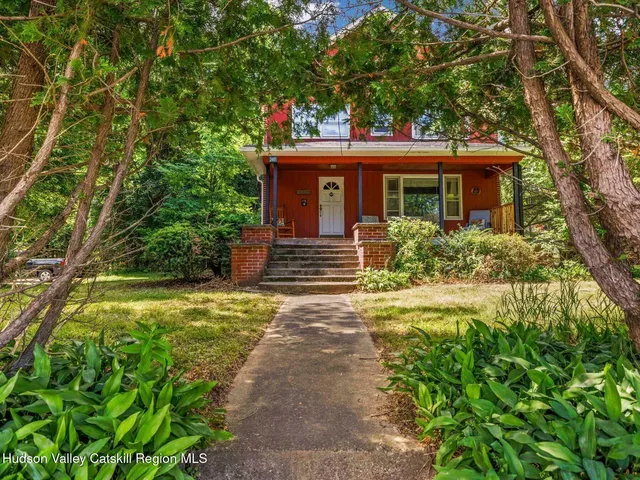 a kitchen with a sink appliances and cabinets
