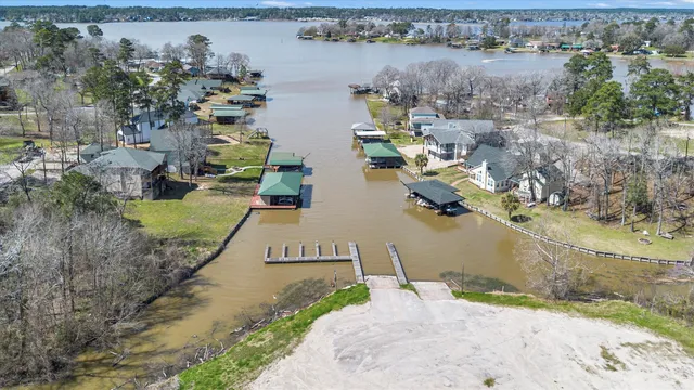 an aerial view of a house with outdoor space