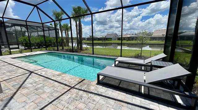 a view of a patio with a yard