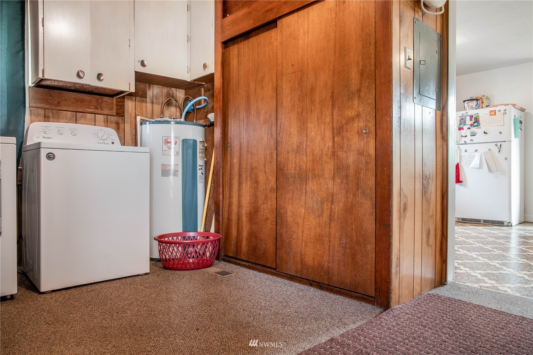6783 Kickerville Road Ferndale, WA 98248 - Photo 15 of 22 a view of a utility room with closet and electronic appliances