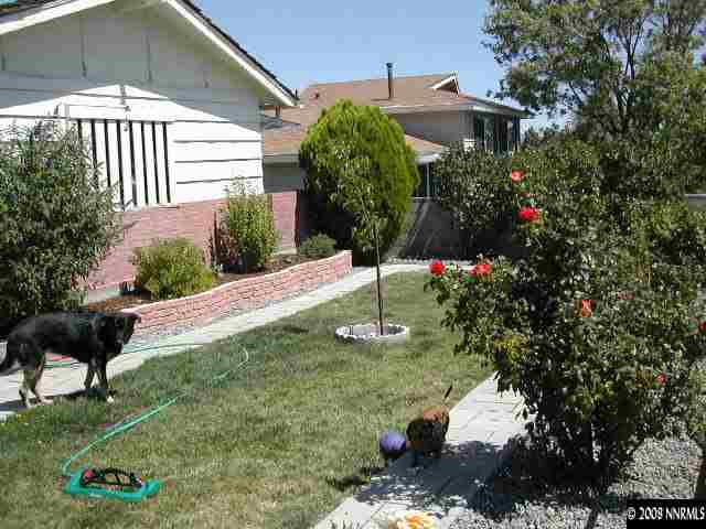 3340 Heights Reno, NV 89503 - Photo 2 of 9 a front view of a house with a yard and potted plants