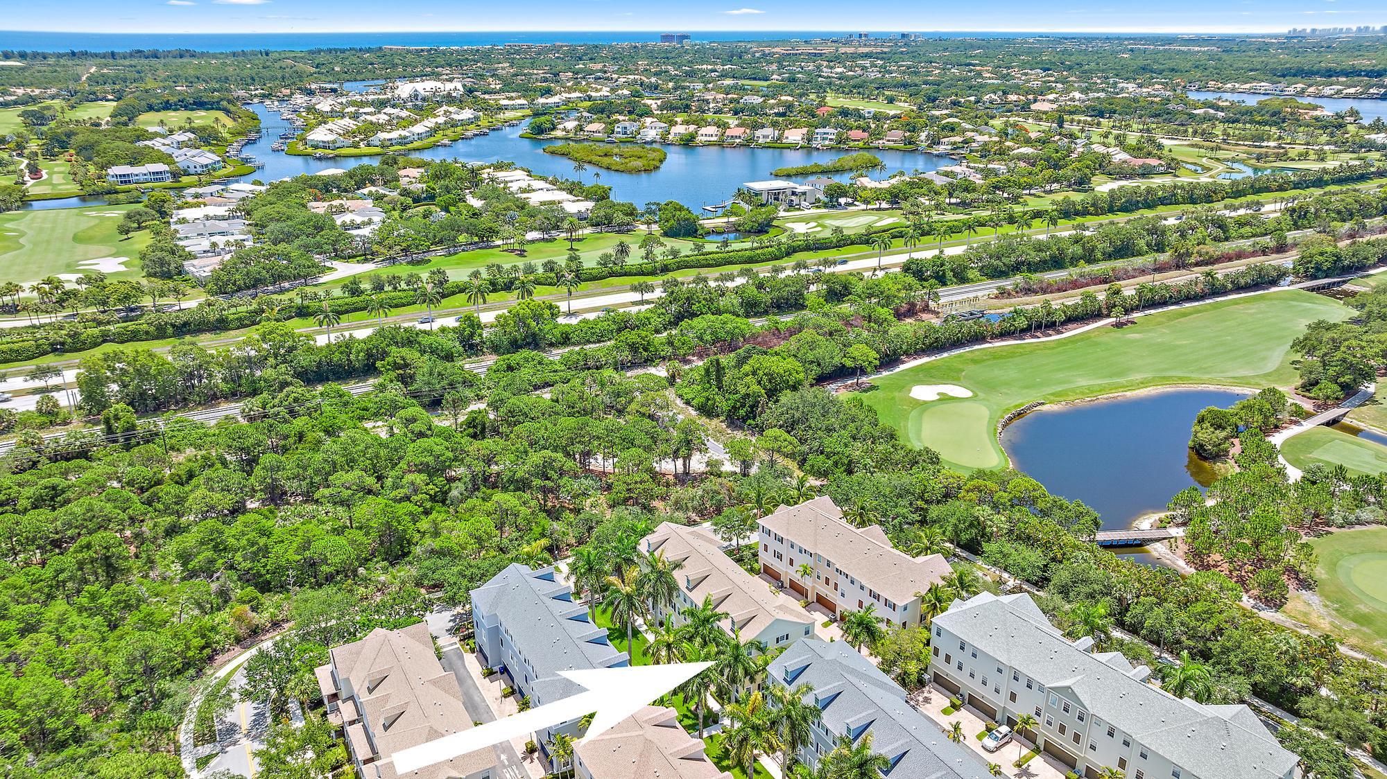 107 Pond Apple Lane, Unit 105 Jupiter, FL 33458 - Photo 27 of 37 view of a city with an ocean view