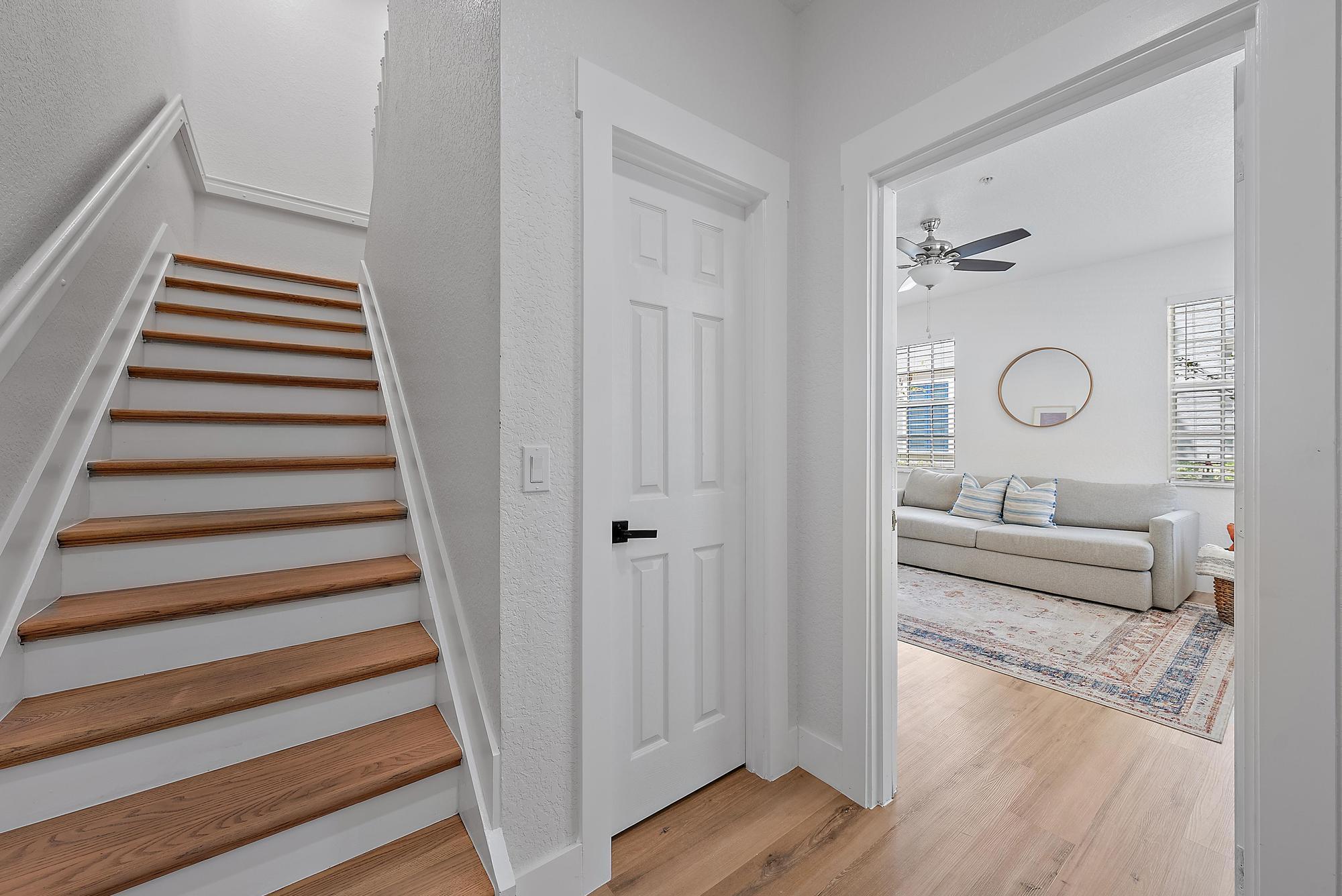 107 Pond Apple Lane, Unit 105 Jupiter, FL 33458 - Photo 5 of 37 a view of a bedroom from the hallway