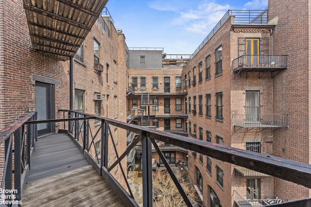 454 West 46th Street, Unit 4CS Manhattan, NY 10036 - Photo 15 of 18 a view of building from balcony