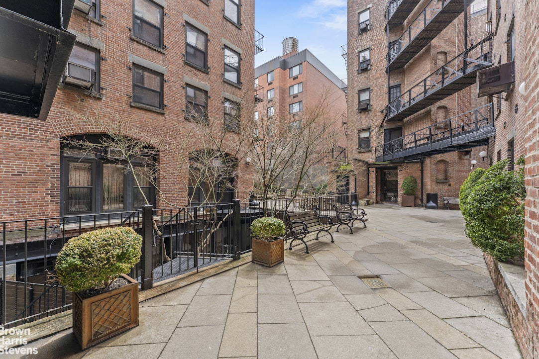 454 West 46th Street, Unit 4CS Manhattan, NY 10036 - Photo 17 of 18 a view of a chairs and tables in the patio