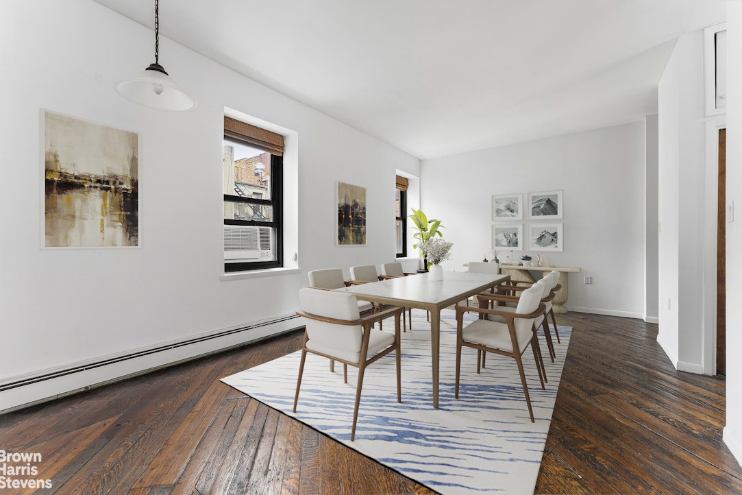454 West 46th Street, Unit 4CS Manhattan, NY 10036 - Photo 5 of 18 a view of a dining room with furniture and wooden floor
