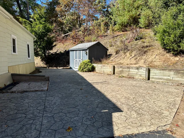 a house view with a backyard space