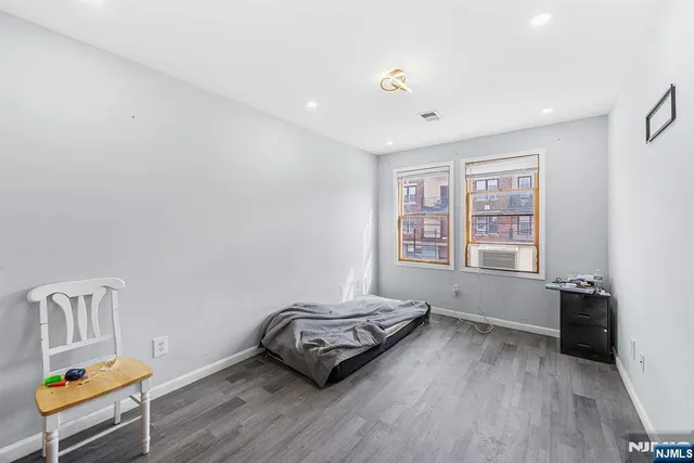 a room with furniture and a window