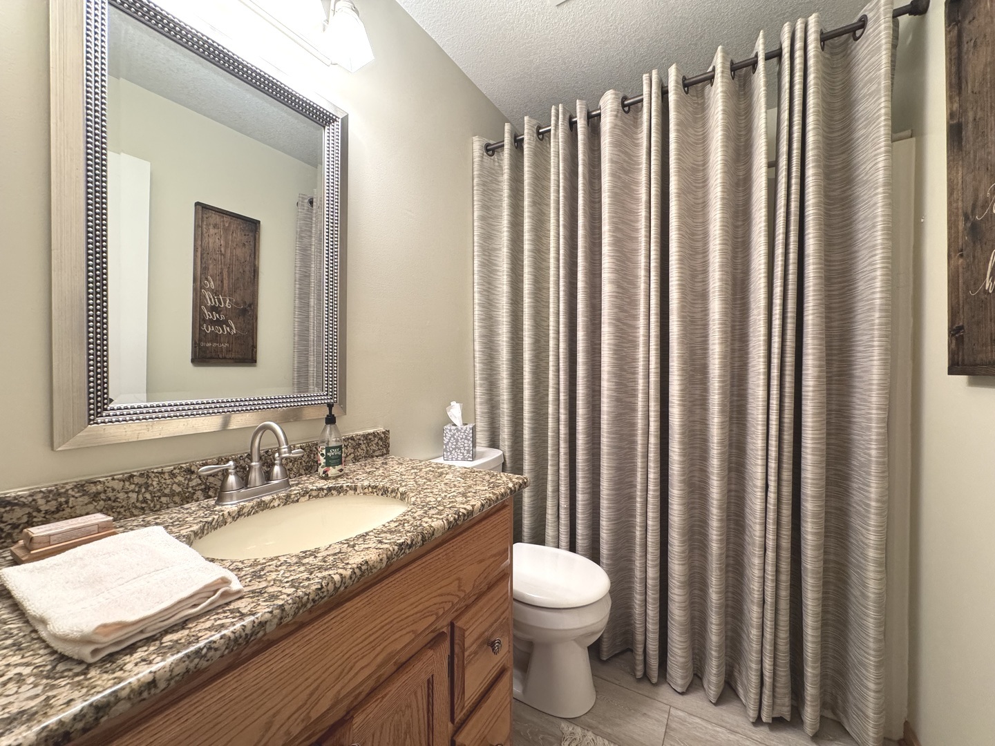 2041 Bluff Road South Kankakee, IL 60901 - Photo 21 of 39 a bathroom with a granite countertop toilet and a sink