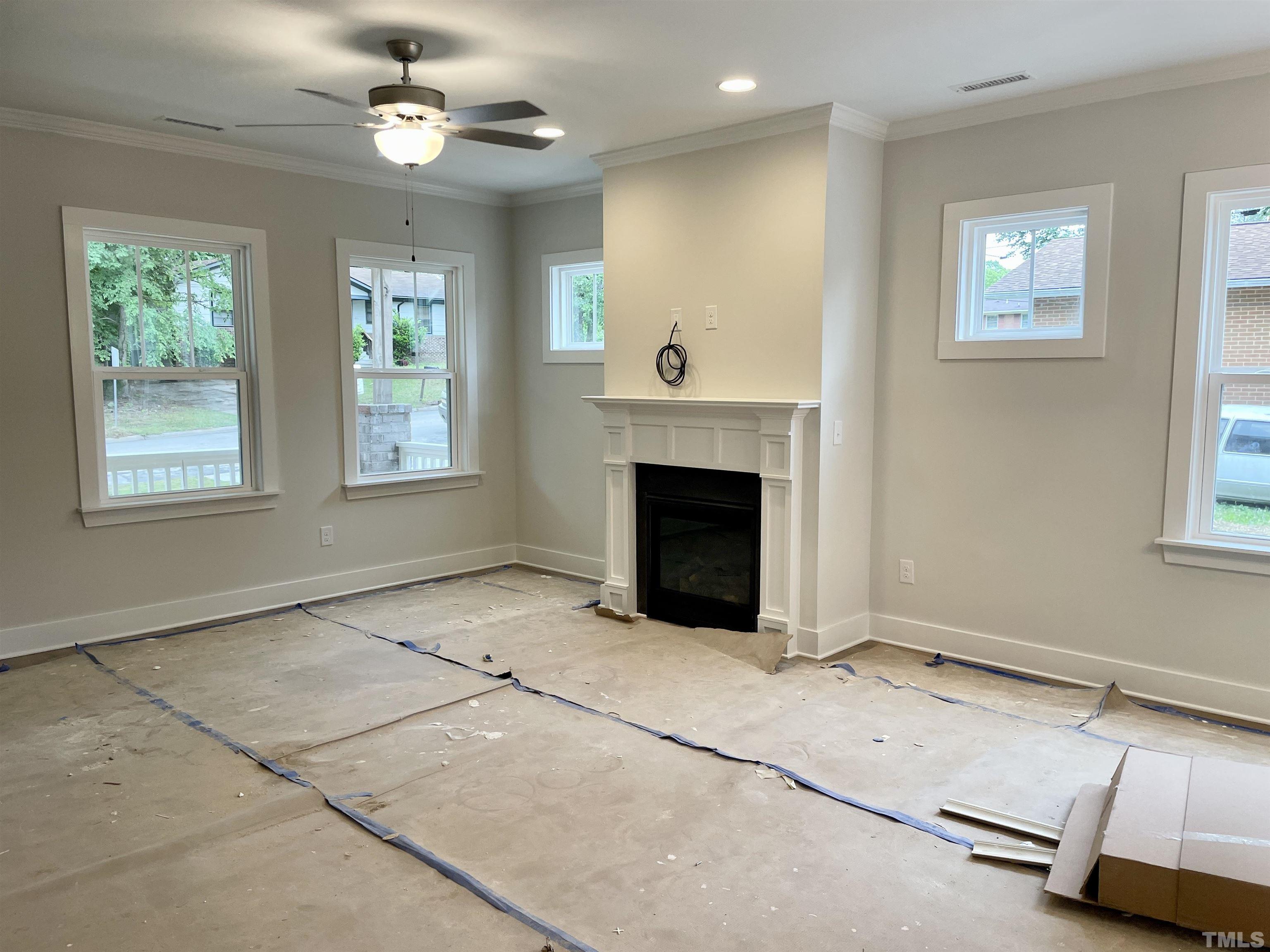 1308 B Castlebay Road Durham, NC 27704 - Photo 5 of 25 a view of an empty room with a window