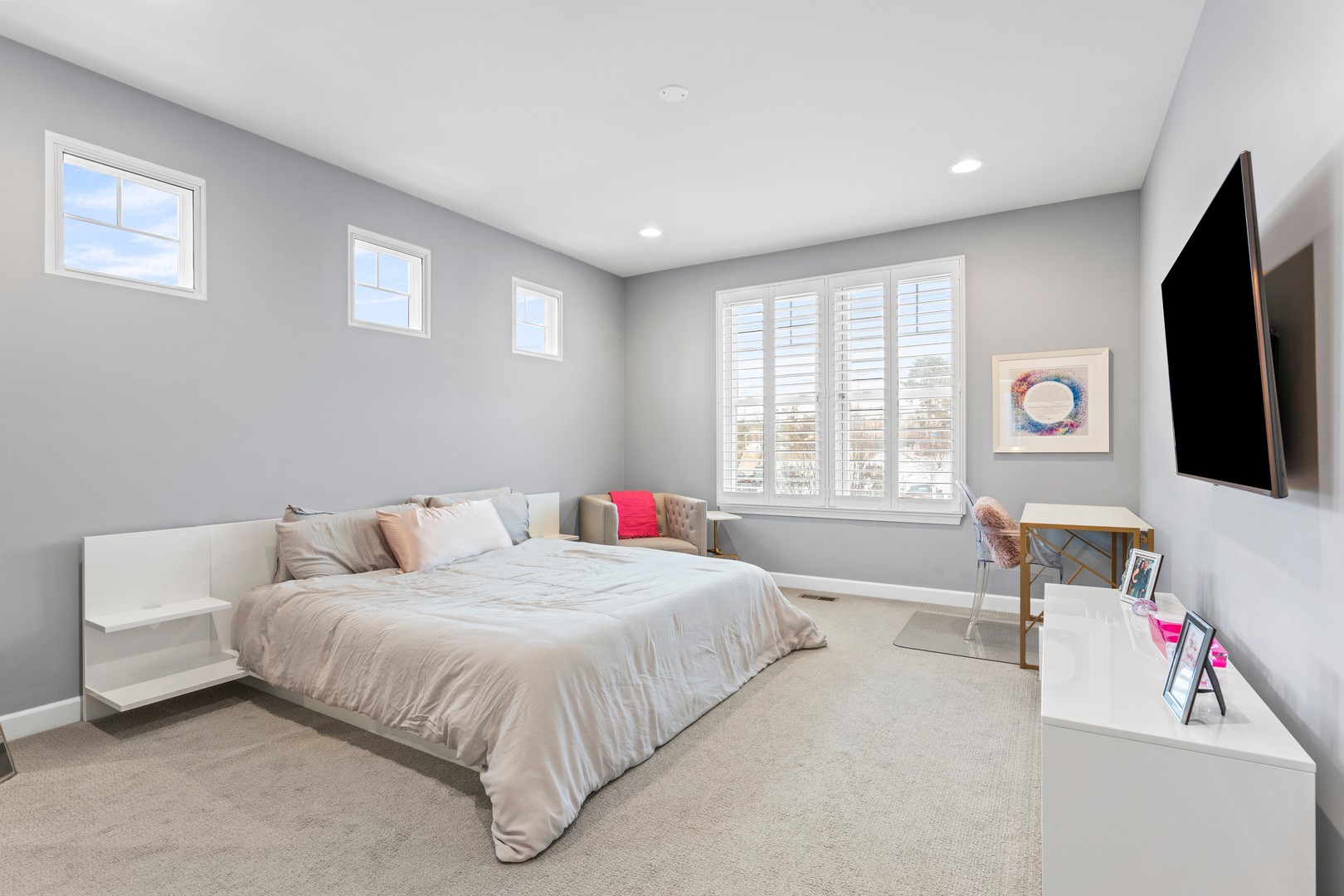 826 Chestnut Street Deerfield, IL 60015 - Photo 13 of 28 a bedroom with a bed and a flat screen tv