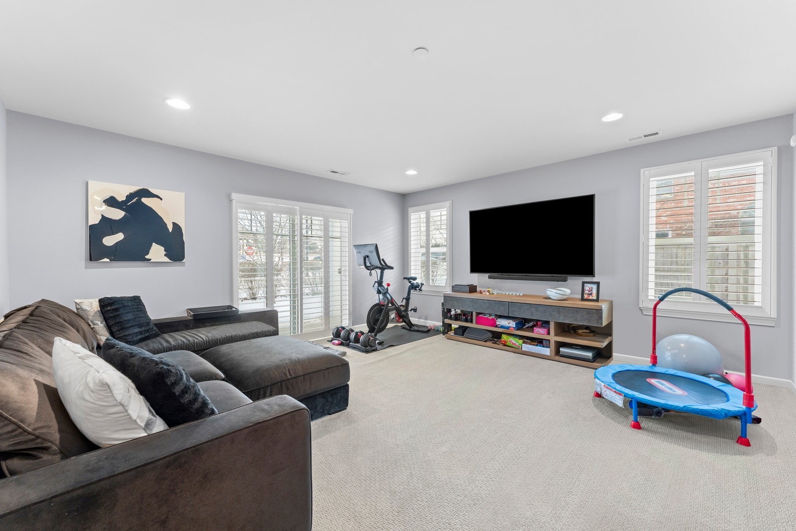 826 Chestnut Street Deerfield, IL 60015 - Photo 18 of 28 a living room with furniture and a flat screen tv