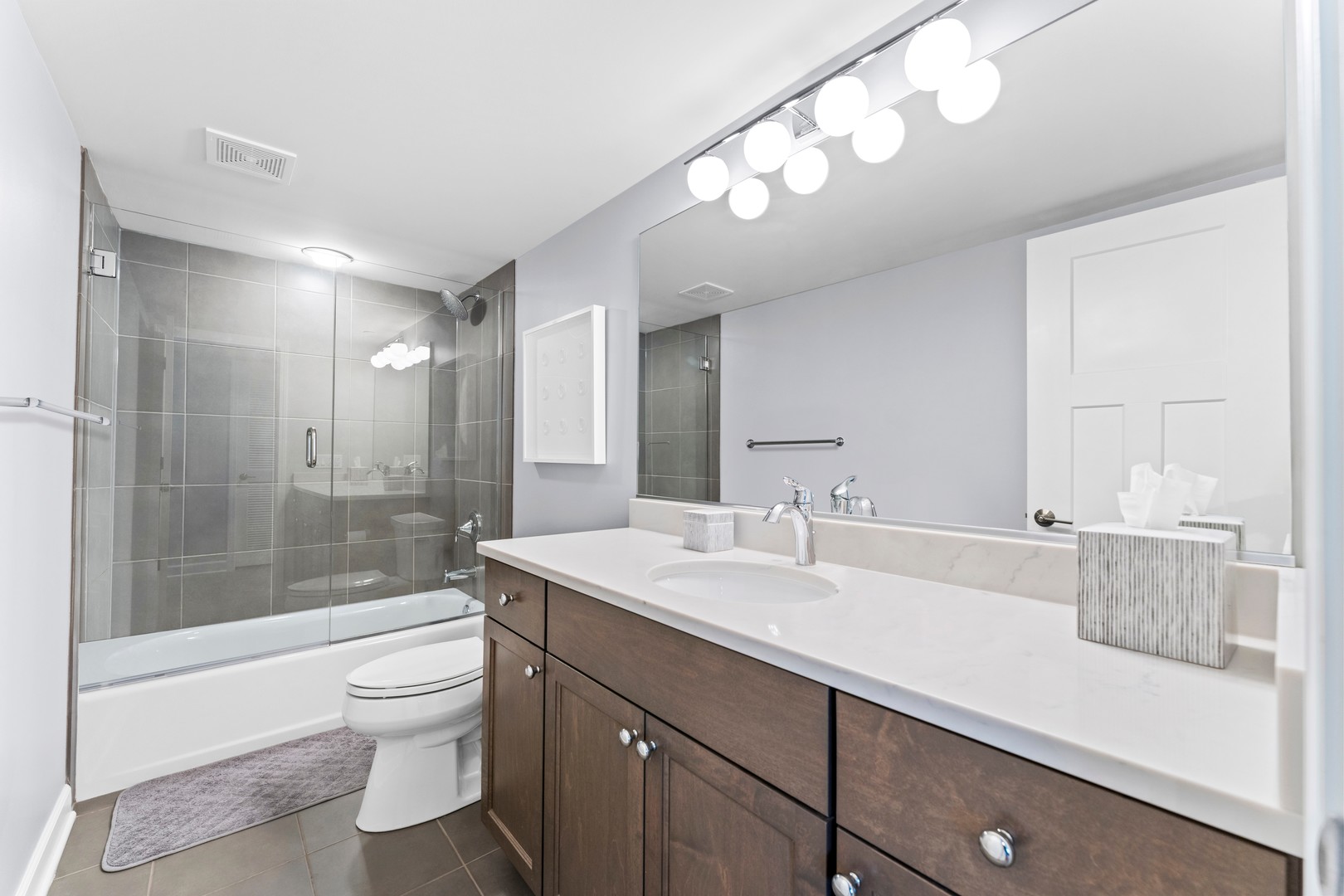 826 Chestnut Street Deerfield, IL 60015 - Photo 21 of 28 a bathroom with a sink a toilet and shower