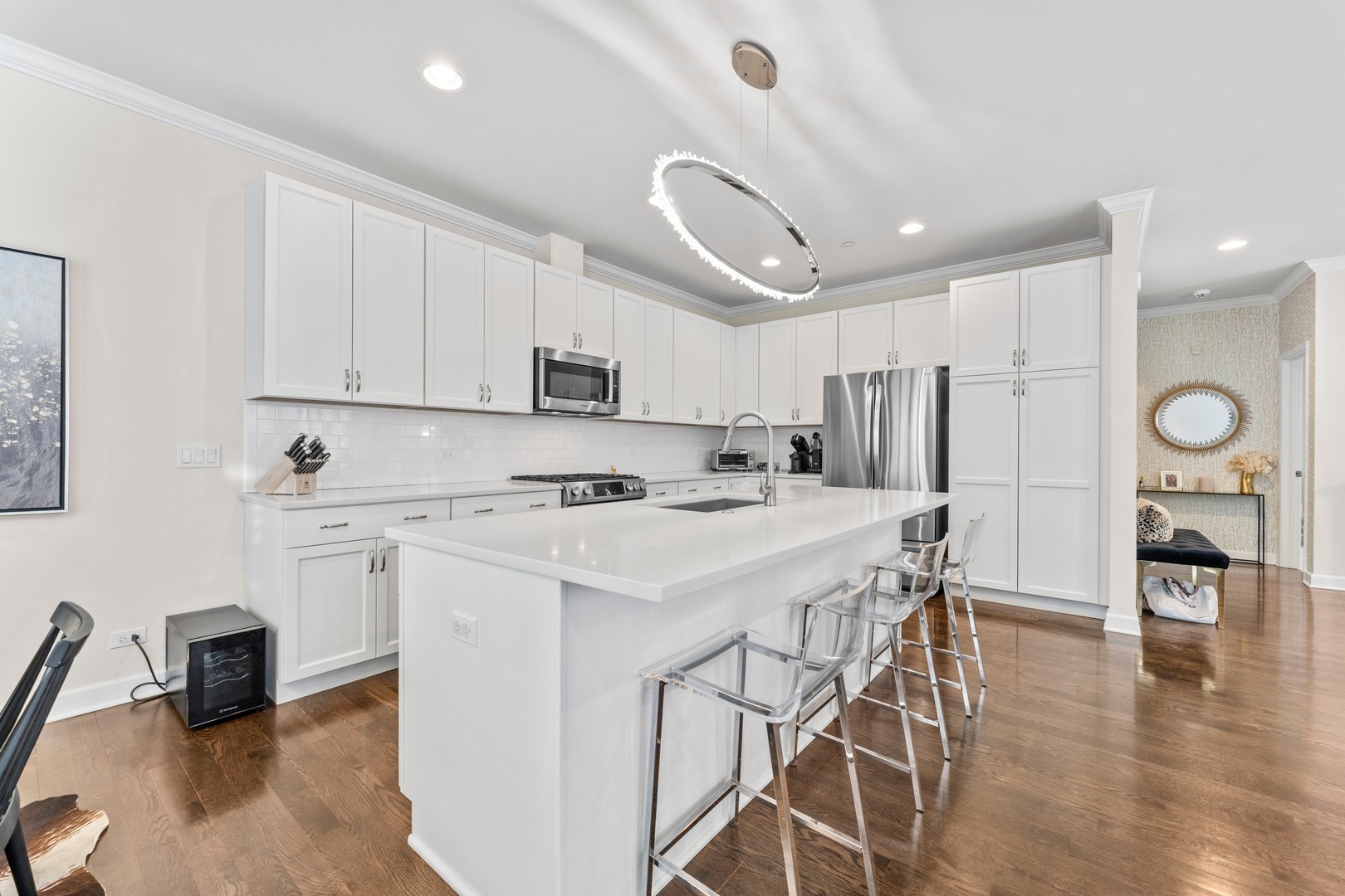 826 Chestnut Street Deerfield, IL 60015 - Photo 5 of 28 a kitchen with a refrigerator a stove cabinets and a dining table
