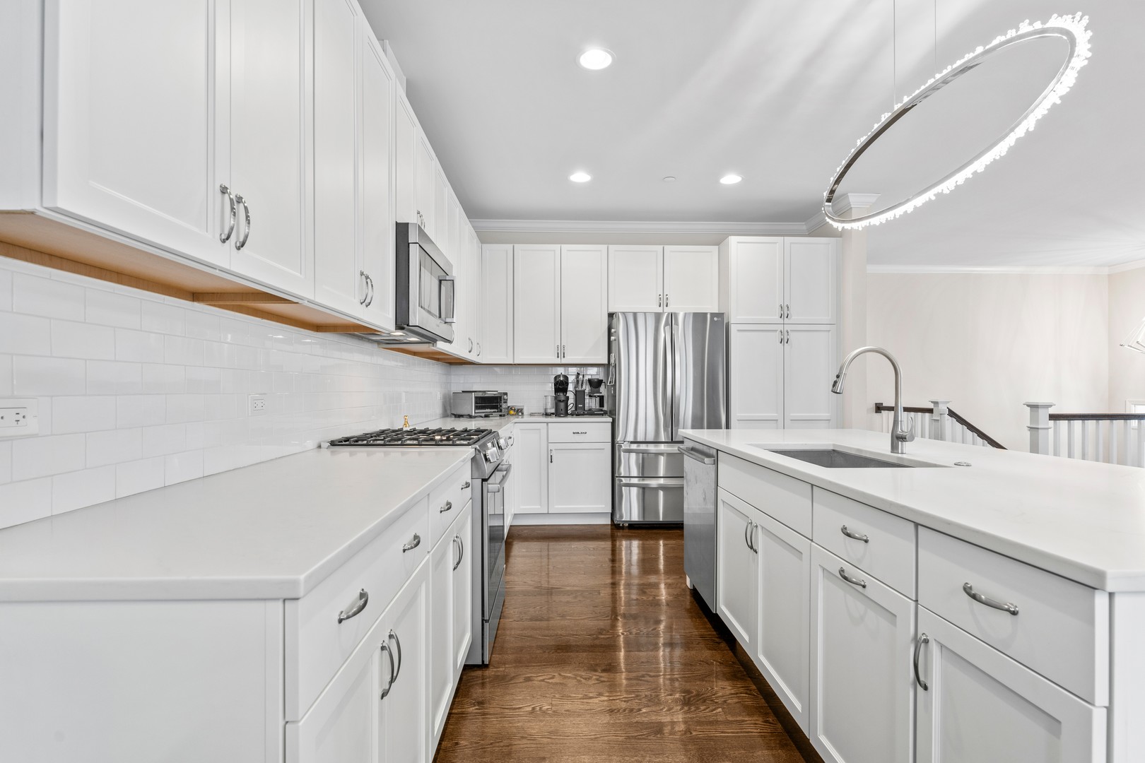 826 Chestnut Street Deerfield, IL 60015 - Photo 6 of 28 a kitchen with white cabinets sink and white appliances