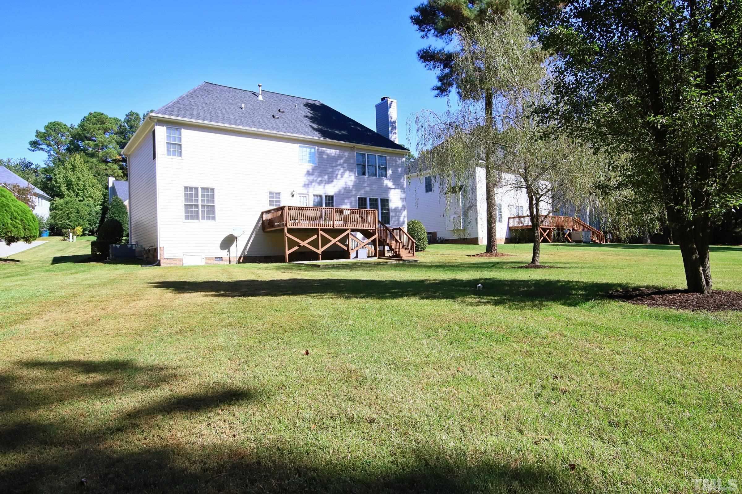 3307 Meadowrun Drive Durham, NC 27707 - Photo 2 of 29 a house view with a garden space