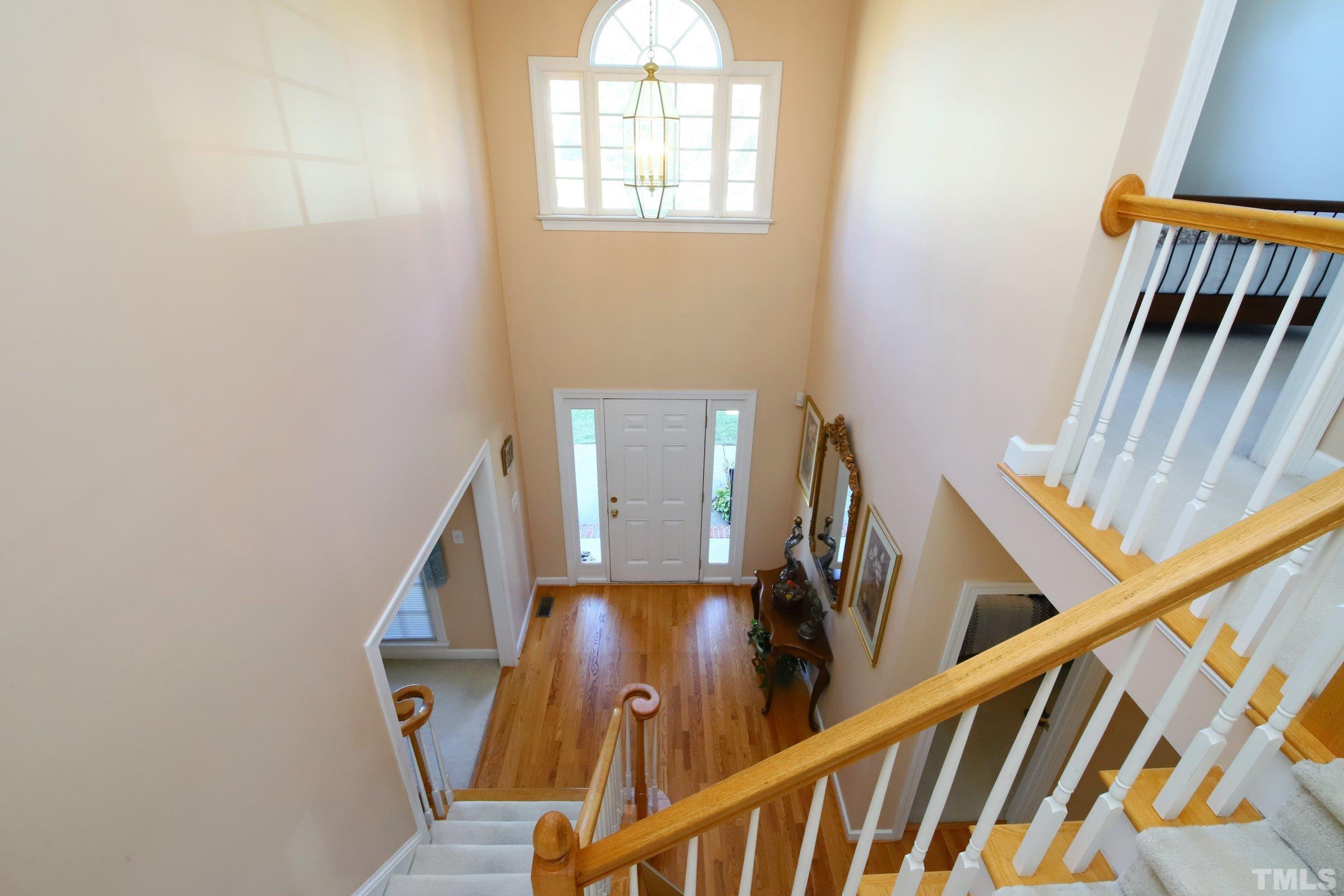 3307 Meadowrun Drive Durham, NC 27707 - Photo 11 of 29 a view of an entryway with wooden floor