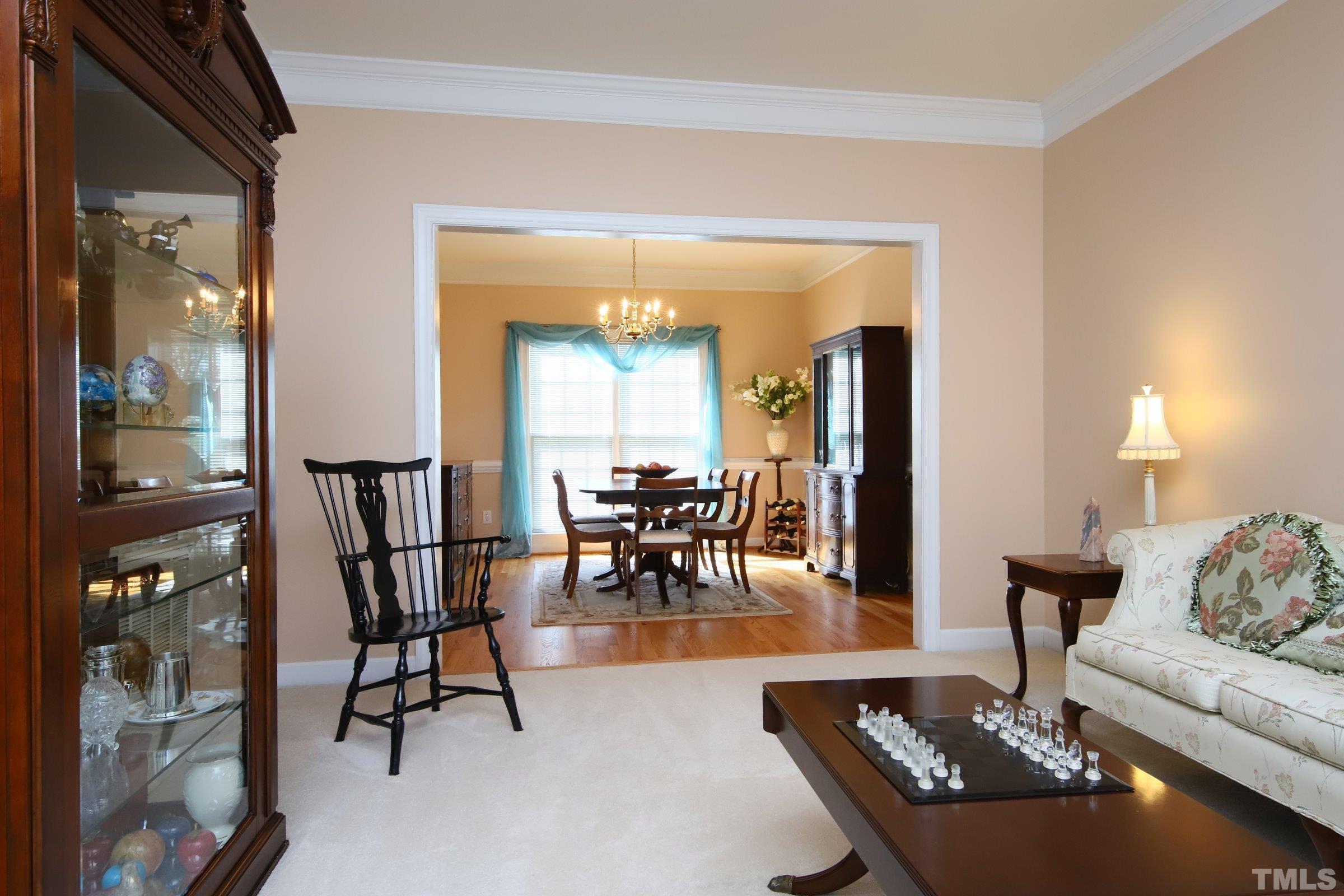 3307 Meadowrun Drive Durham, NC 27707 - Photo 13 of 29 a living room with furniture and a large window