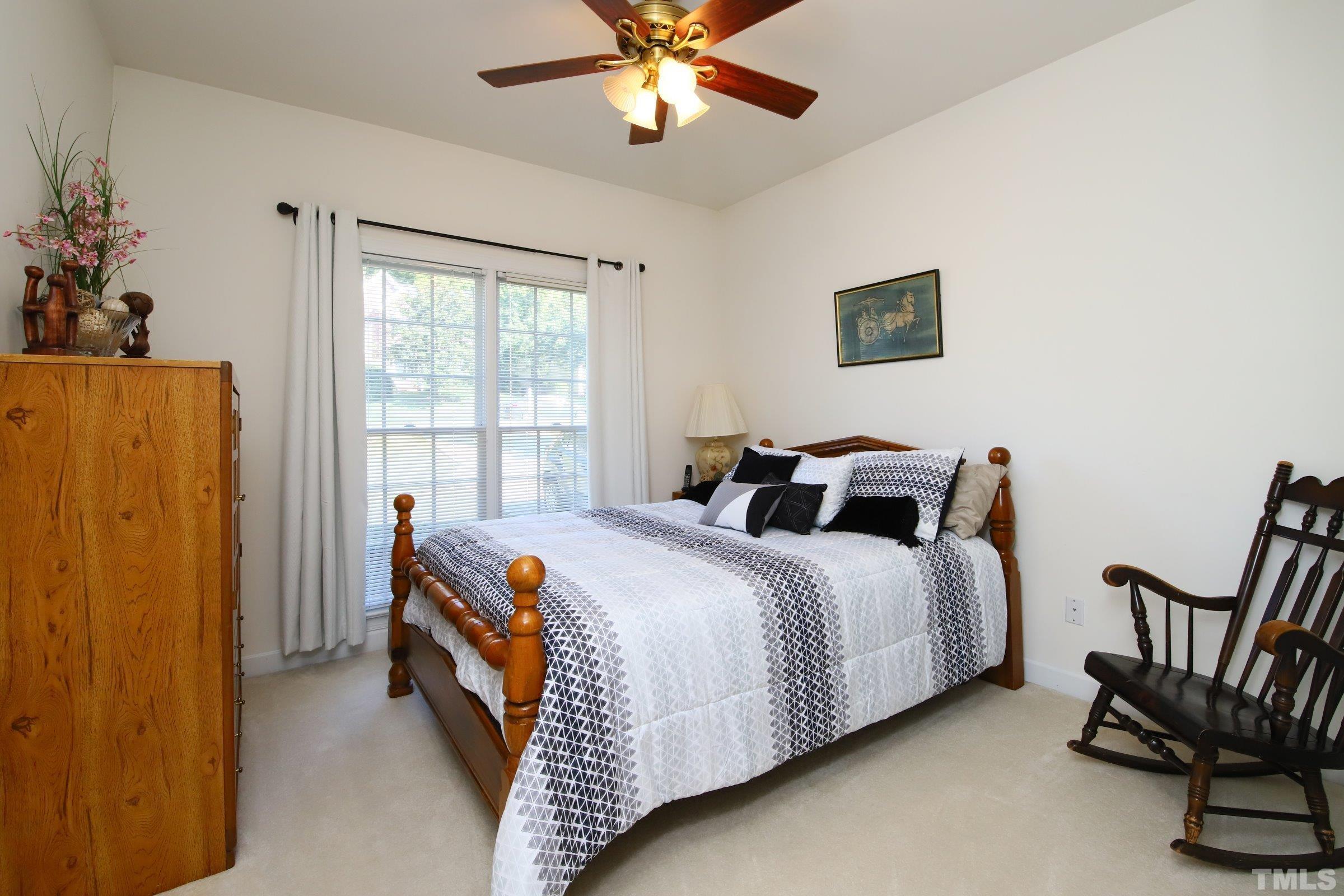 3307 Meadowrun Drive Durham, NC 27707 - Photo 22 of 29 a bed room with bed and window