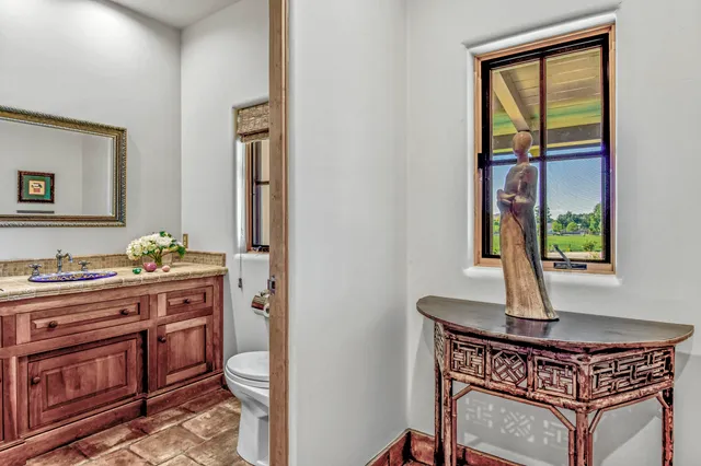 a living room with furniture and a rug