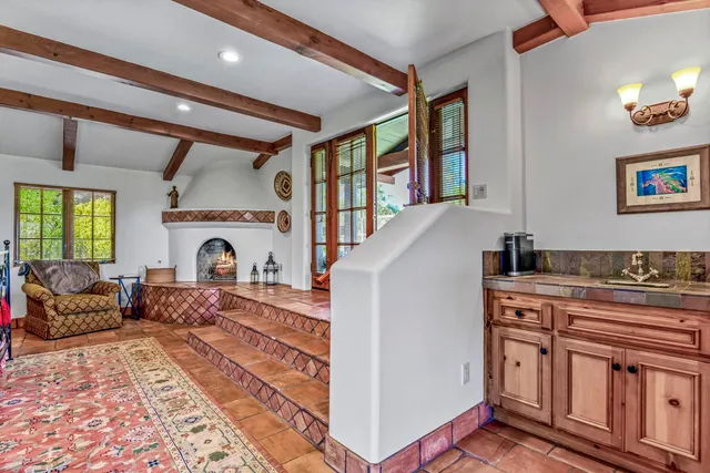 a view of swimming pool with outdoor seating and city view