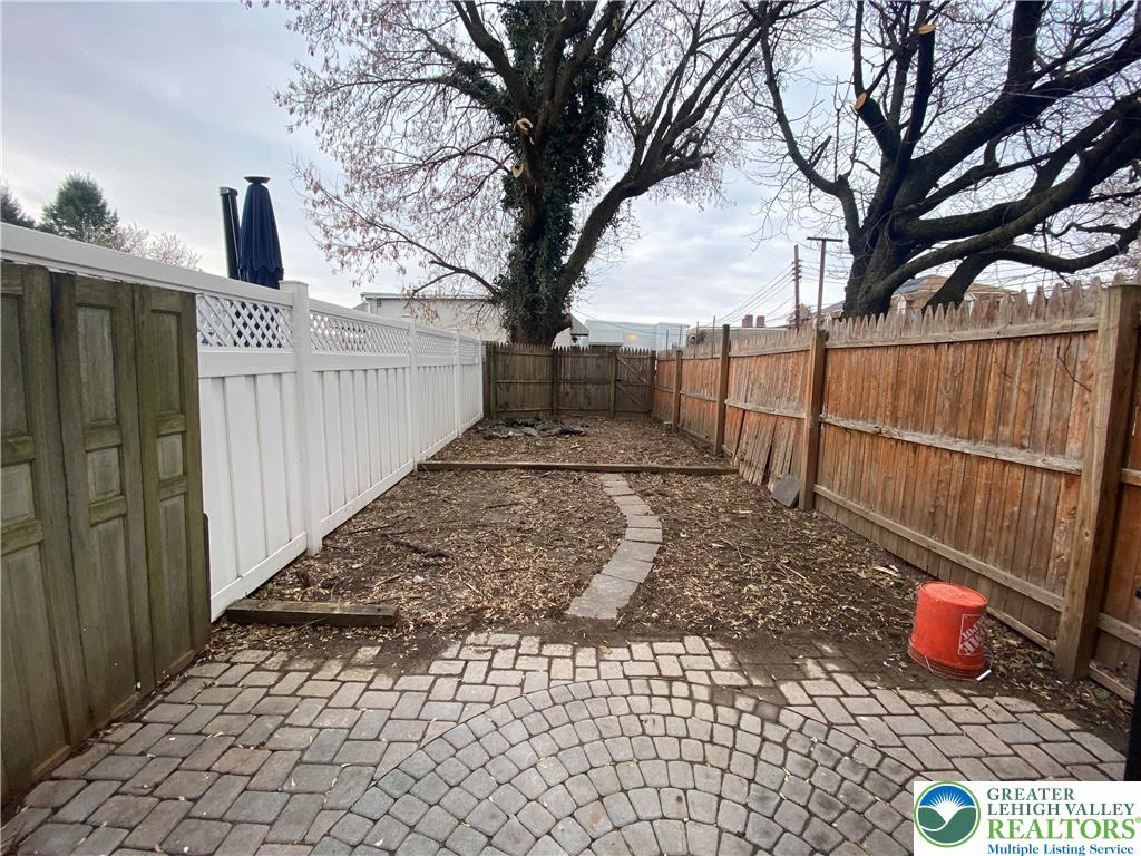 122 South Spruce Street Nazareth, PA 18064 - Photo 3 of 11 a view of a pathway with a wrought fence