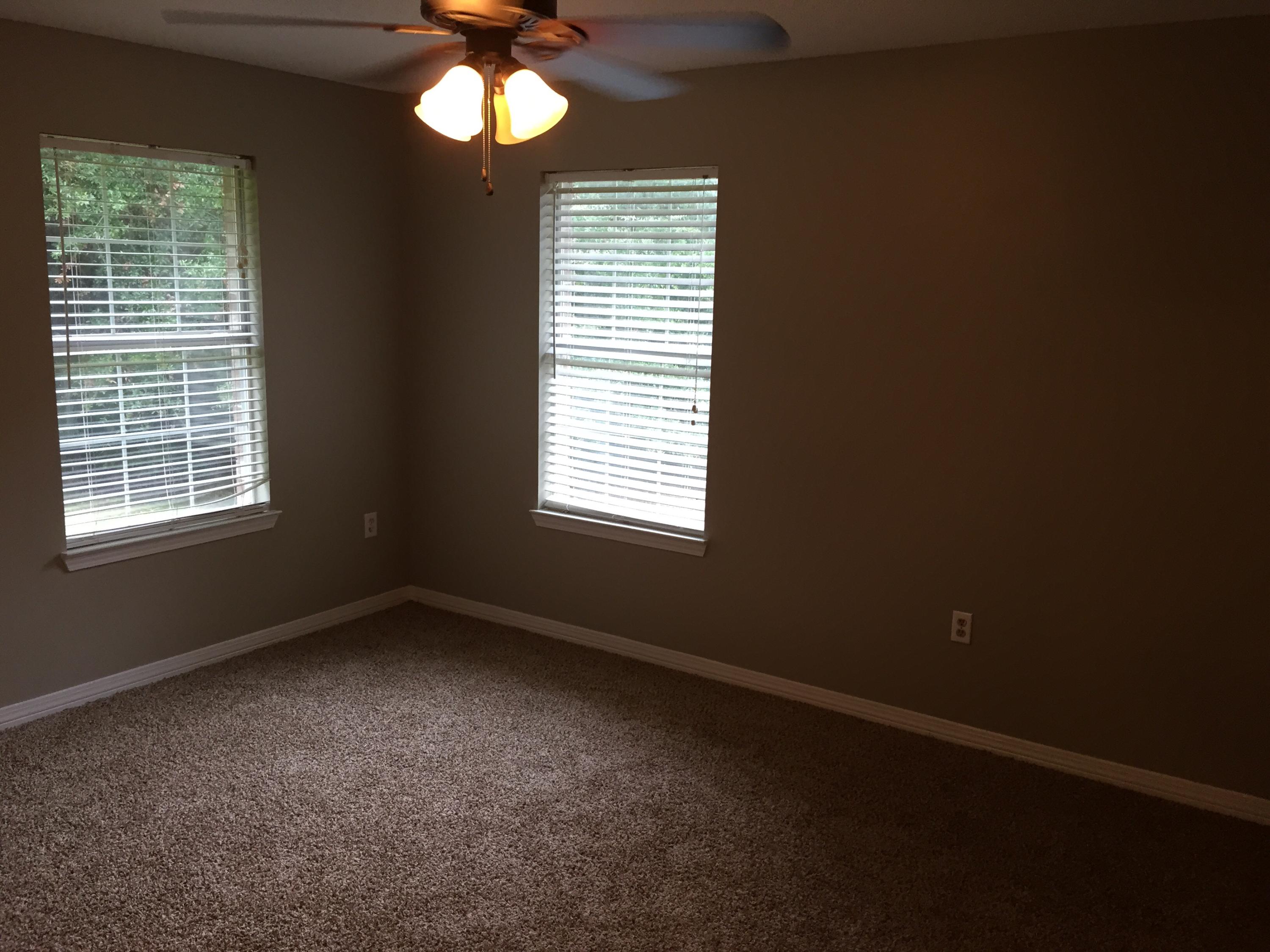 5780 Wildwood Road Crestview, FL 32536 - Photo 21 of 33 a view of an empty room with a window