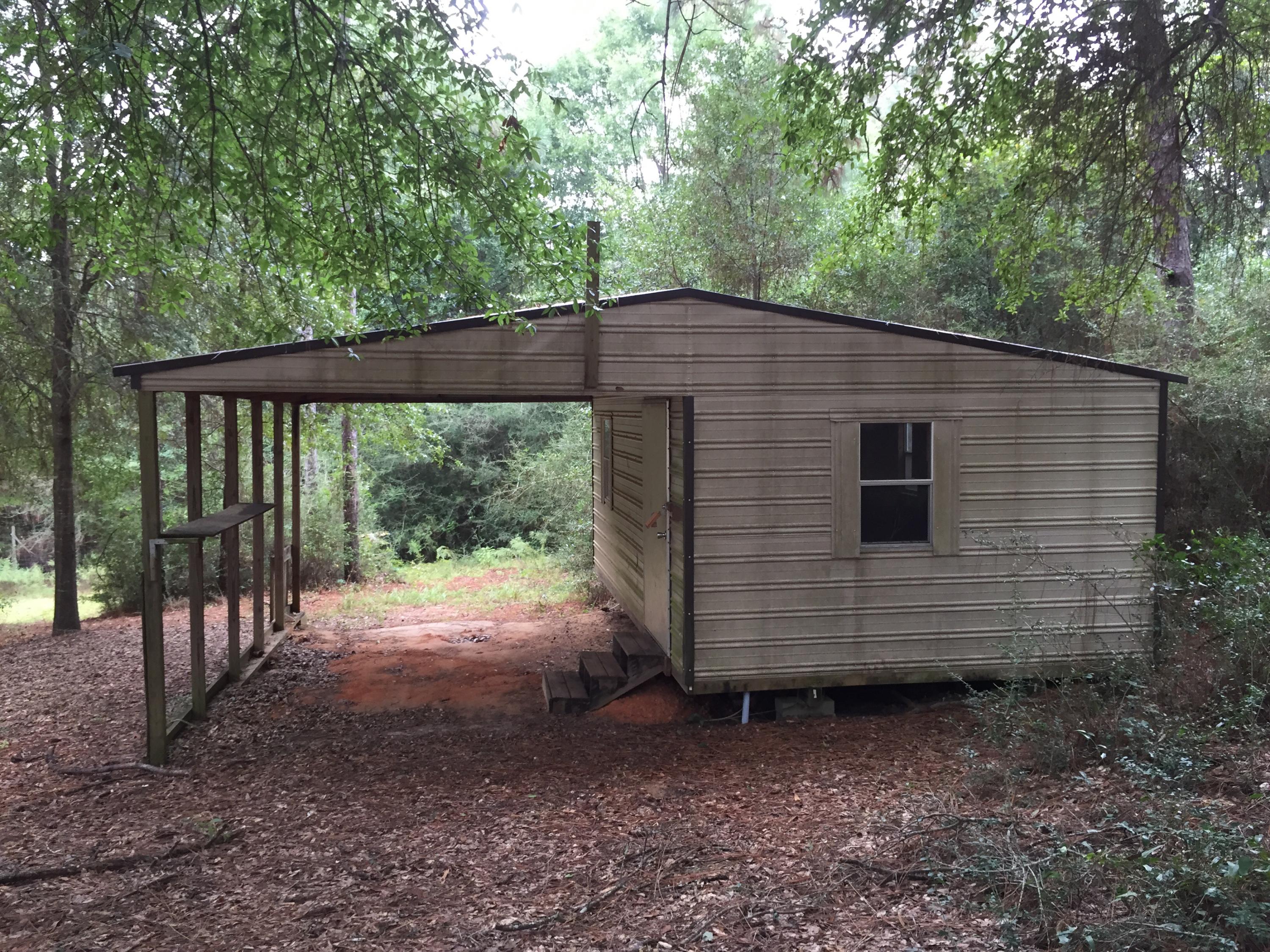 5780 Wildwood Road Crestview, FL 32536 - Photo 31 of 33 a view of a backyard