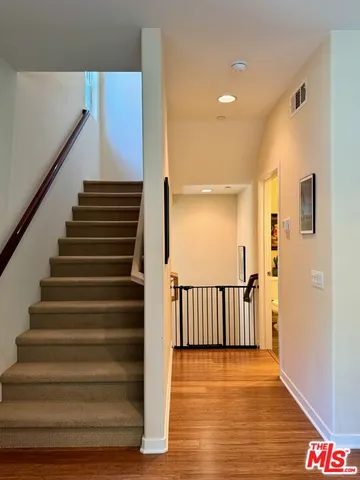 a view of entryway with wooden floor