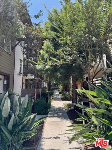 a view of street with sitting area