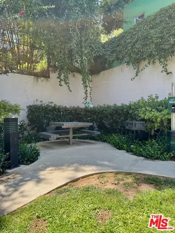 a view of a lake with a building in the background