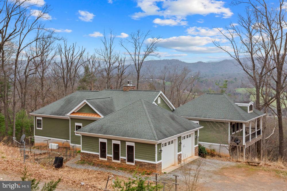 9586 Brunk Spring Lane Broadway, VA 22815 - Photo 2 of 57 a aerial view of a house with a yard