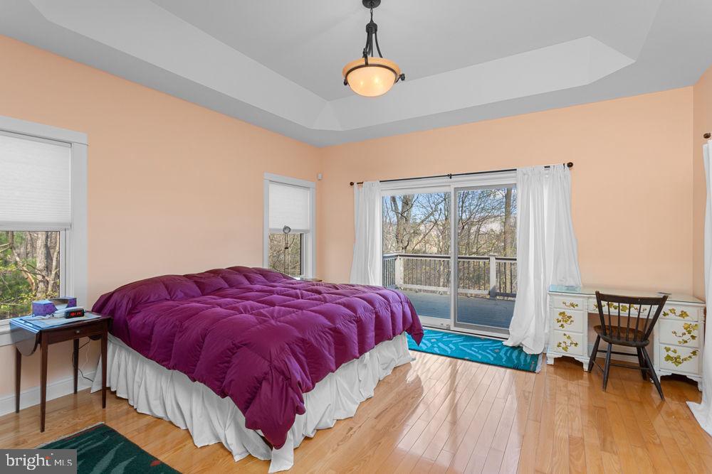 9586 Brunk Spring Lane Broadway, VA 22815 - Photo 25 of 57 a bedroom with a bed and a window