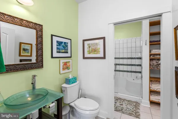 a bathroom with a toilet and a sink