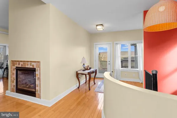 a view of a livingroom with furniture and a fireplace