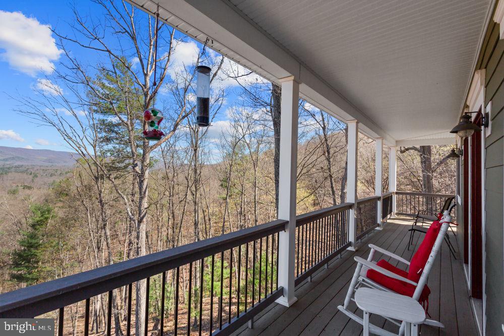 9586 Brunk Spring Lane Broadway, VA 22815 - Photo 43 of 57 a view of balcony with furniture