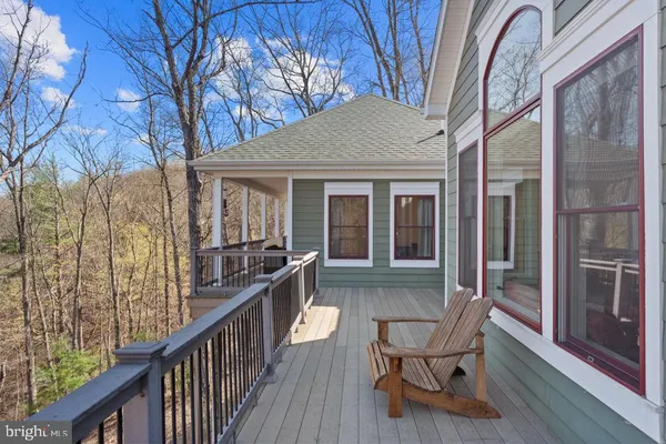 a view of backyard with cabin