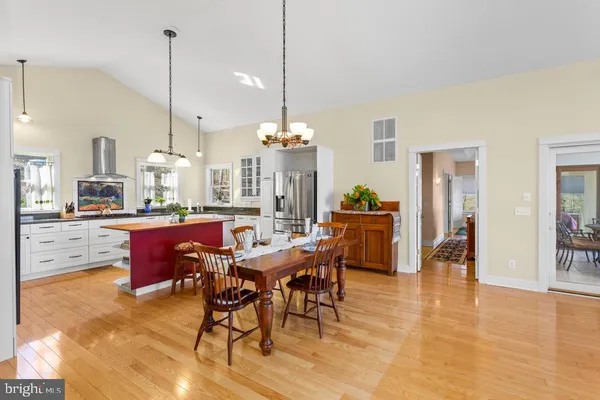 a fireplace with a painting on the wall