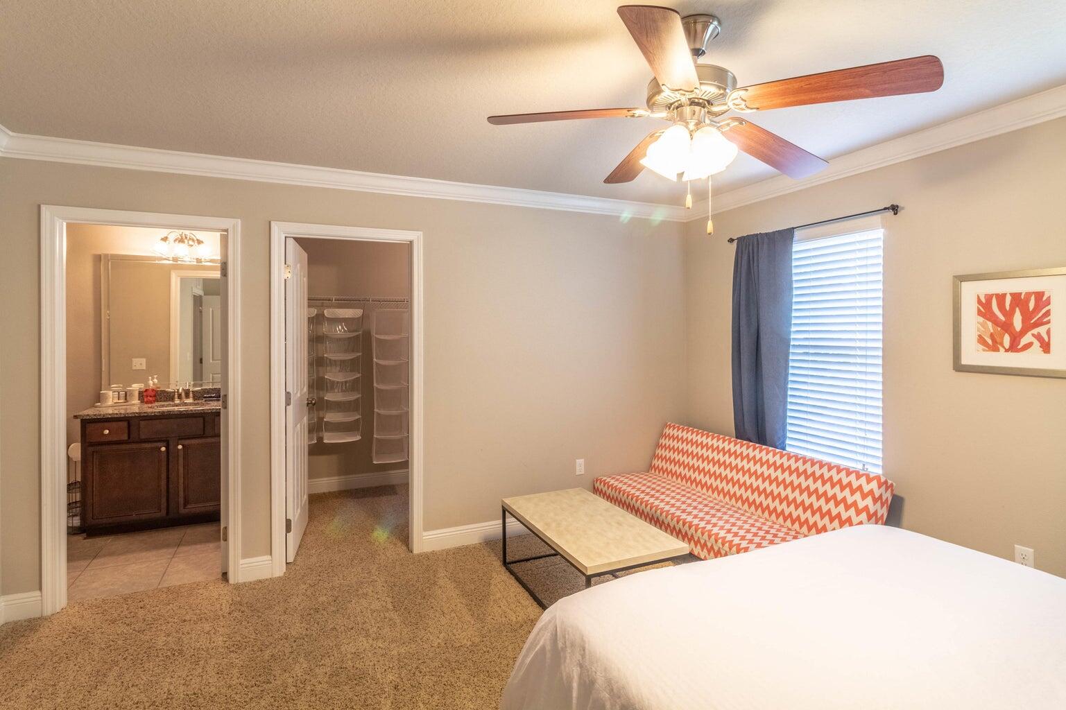 7 Barbados Lane Inlet Beach, FL 32461 - Photo 11 of 15 a bedroom with a bed and a chandelier