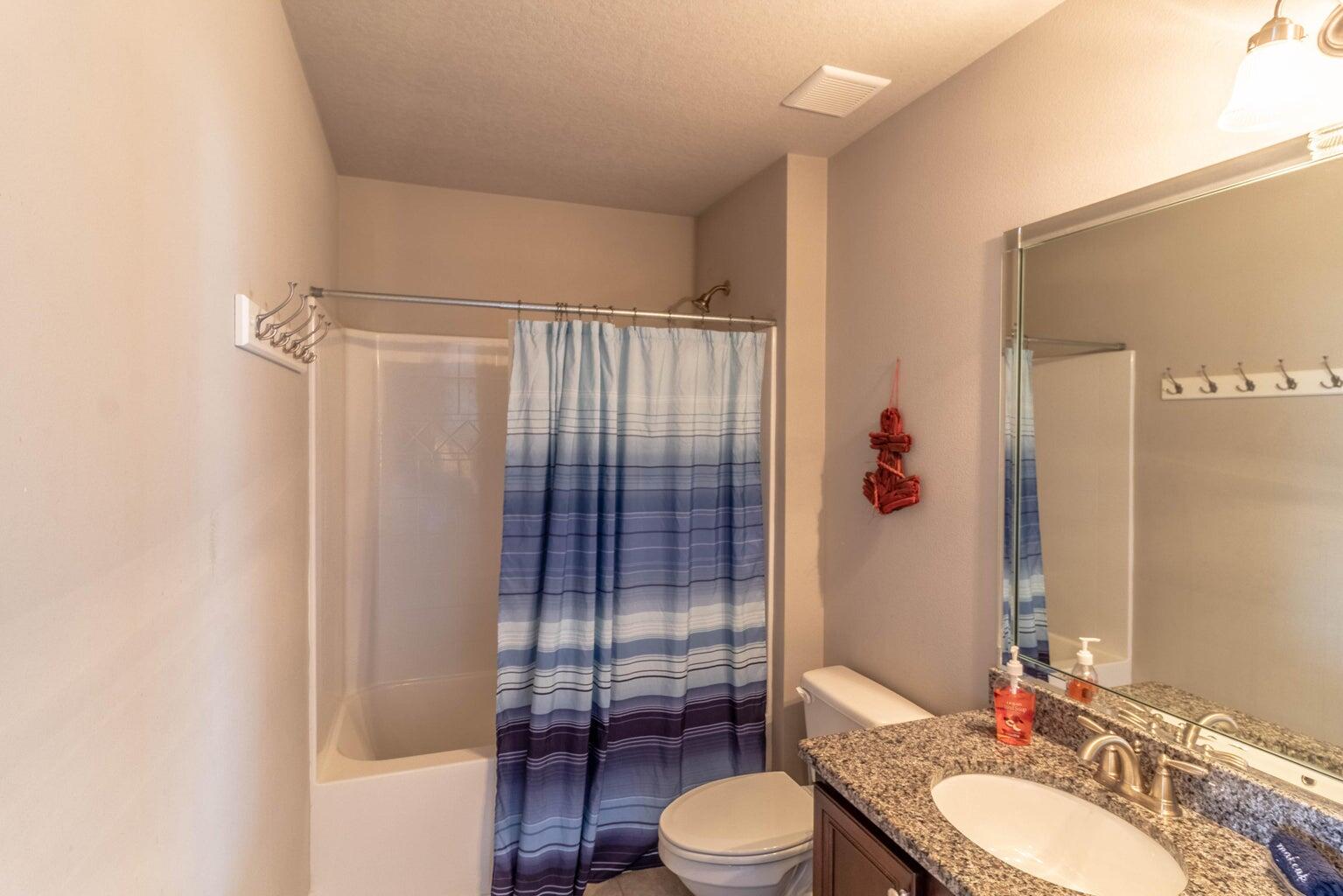 7 Barbados Lane Inlet Beach, FL 32461 - Photo 12 of 15 a bathroom with a sink toilet and shower